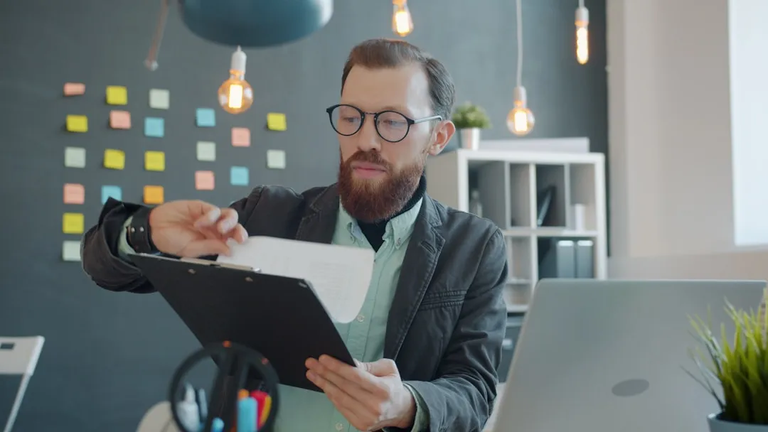 Buyer reviewing due diligence documents for a funeral home acquisition