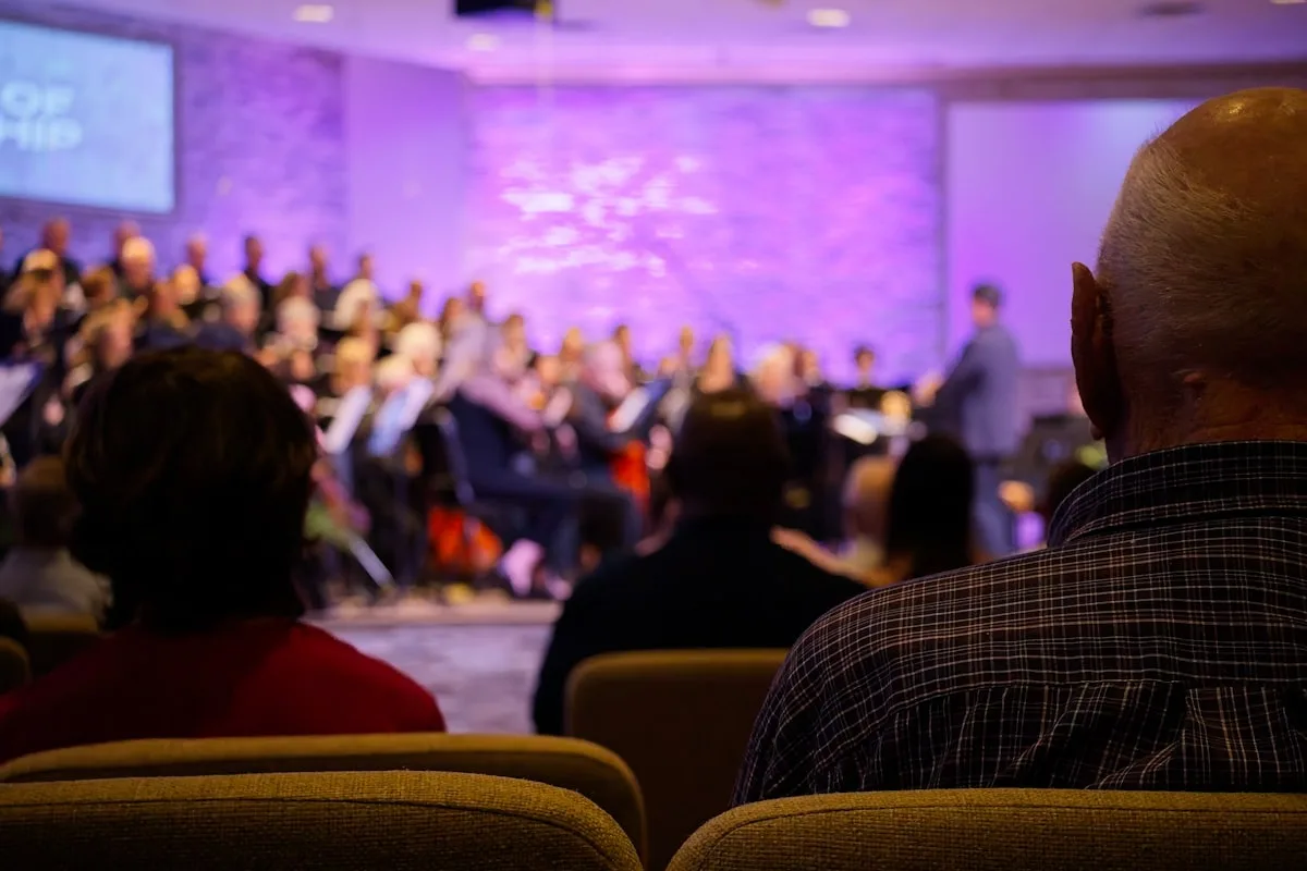 Community gathering at a local event representing outreach and relationship building