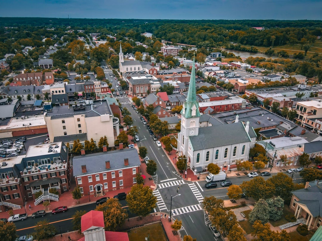 Aerial view of a small town main street with multiple commercial buildings