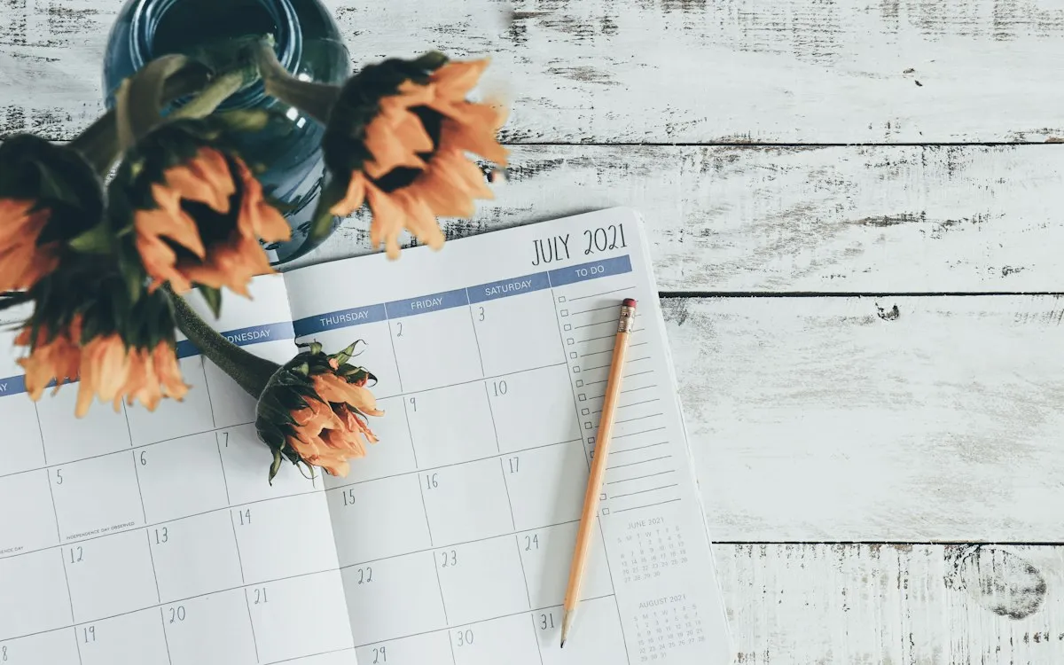 Business strategy planning desk with calendar and autumn light