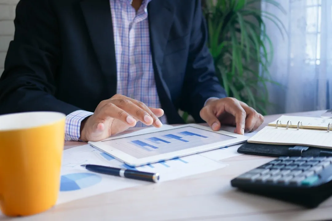 Accountant reviewing financial spreadsheet at business meeting