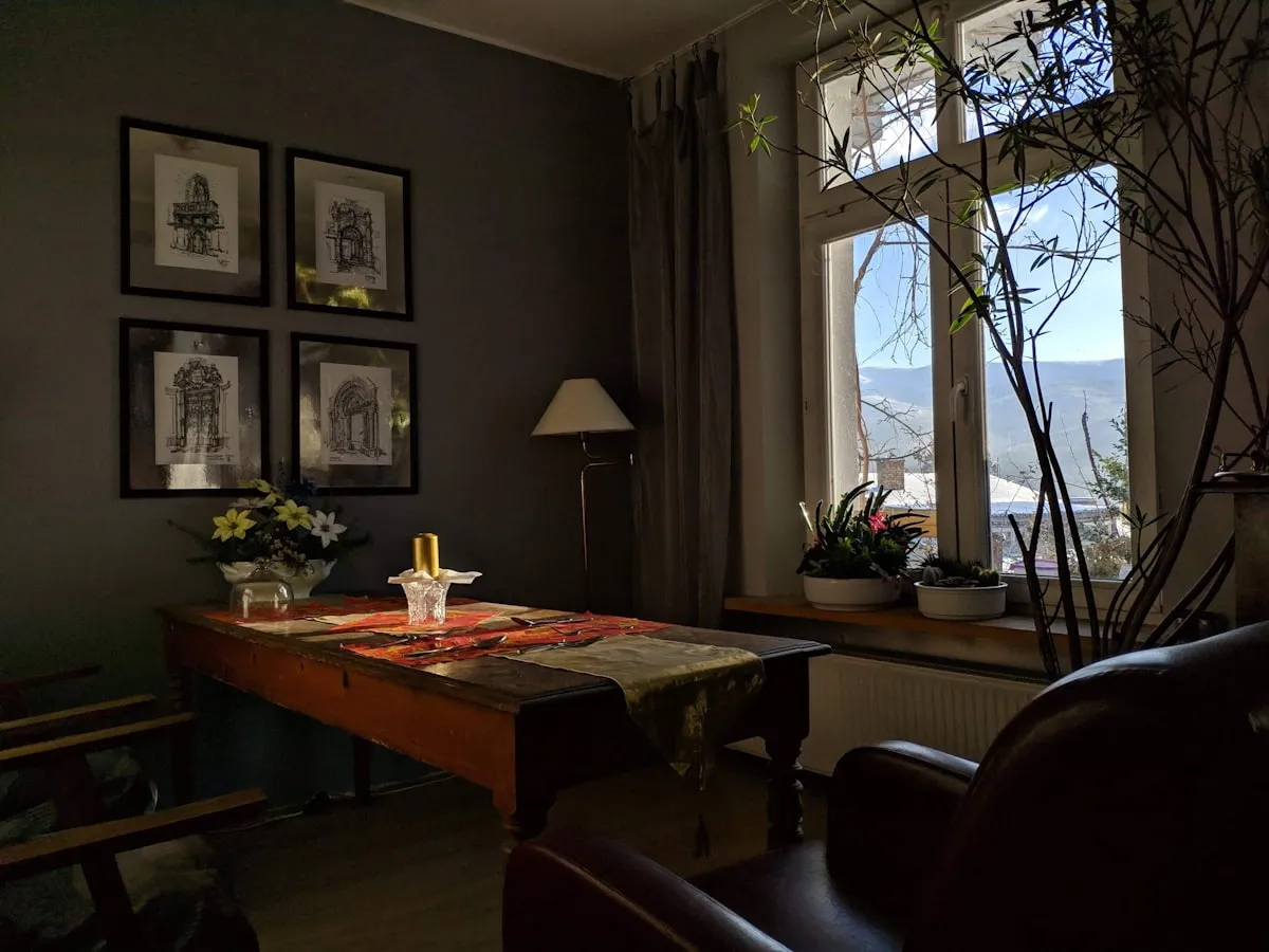 Funeral home professional in consultation office with warm modern interior
