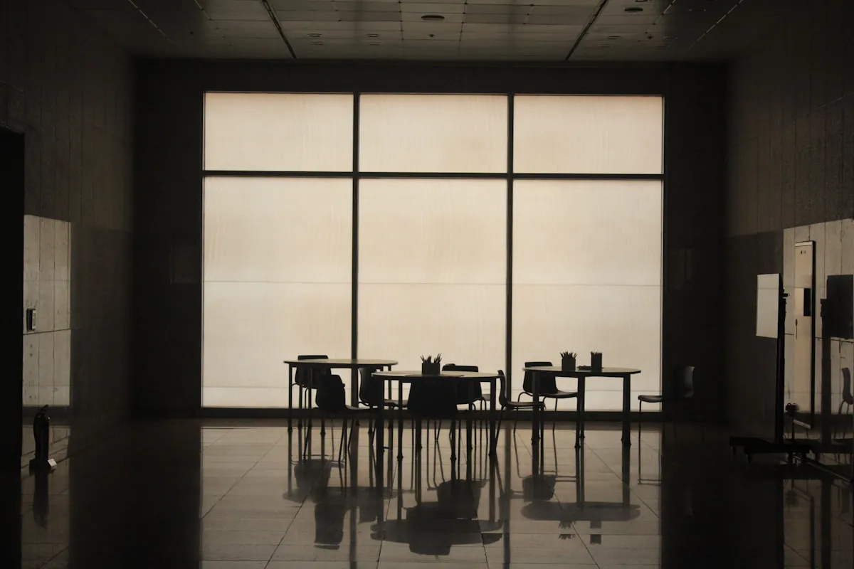 Empty professional office interior with papers and desk