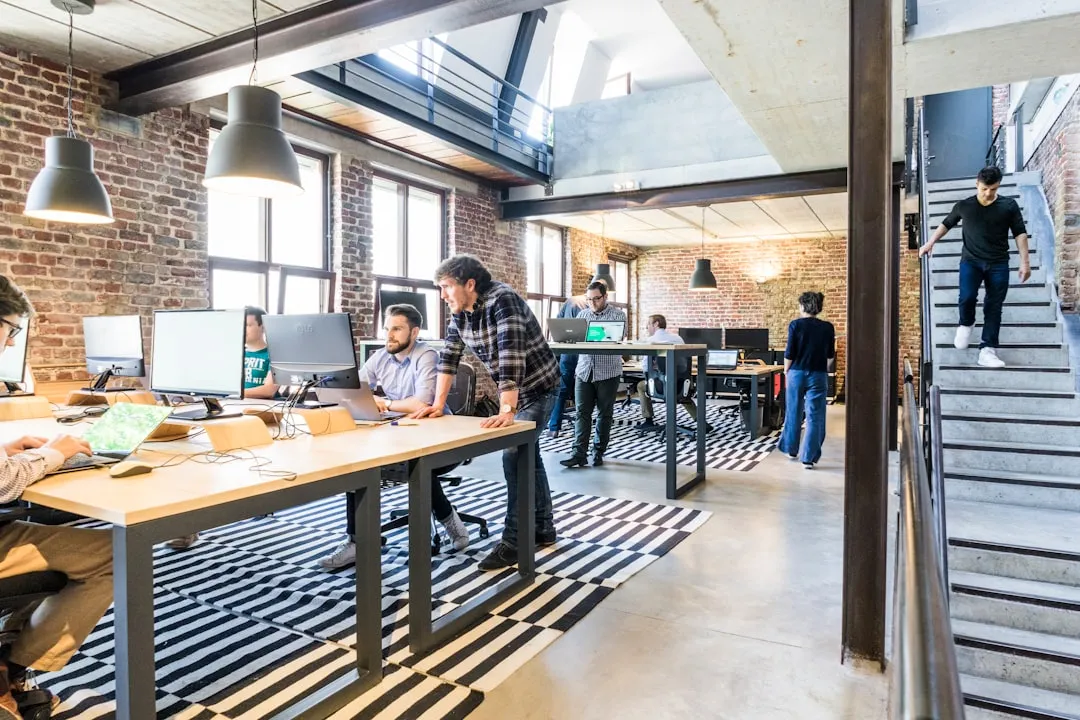 Startup team collaborating in a modern technology office workspace