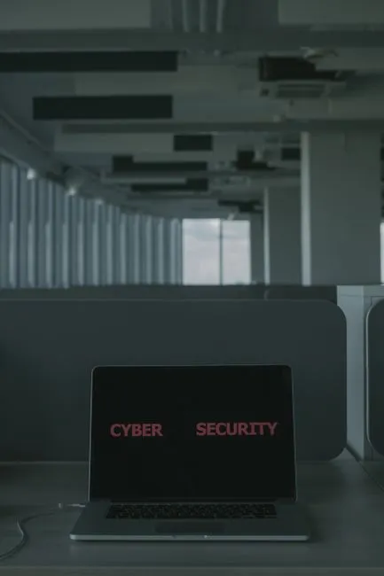 Computer screen showing cybersecurity alert notifications in professional office