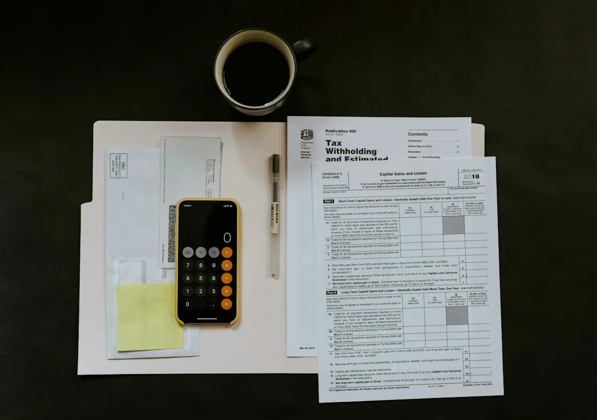 Financial documents and tax planning materials on a professional desk
