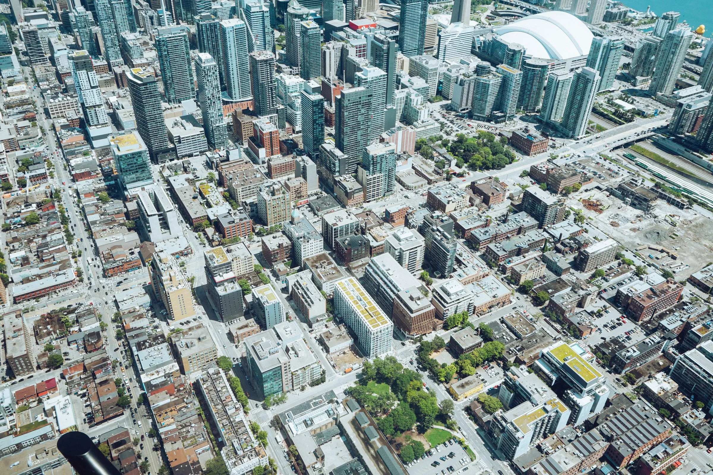 Aerial view of a modern metropolitan city skyline with commercial buildings